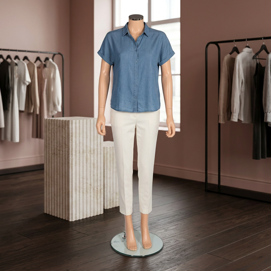 Beat 01 female skin-tone mannequin in a clay-pink boutique