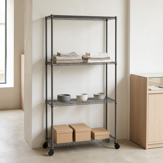 Four-tier narrow mobile carbon grey wire shelving displaying textiles and ceramics in a minimal retail setting