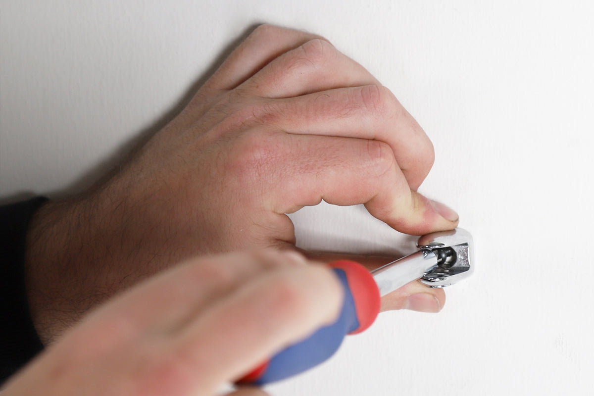 2.  Affix the first Clip onto the wall
