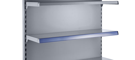 11. Place the top edge first onto the front edge of the shelf, then secure