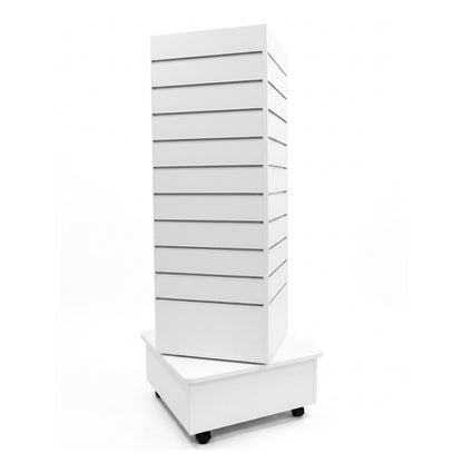 A tall white slat-front storage cabinet or display unit with multiple drawers or doors, shown stacked on a matching white base with small black caster wheels, photographed on a clean white background.
