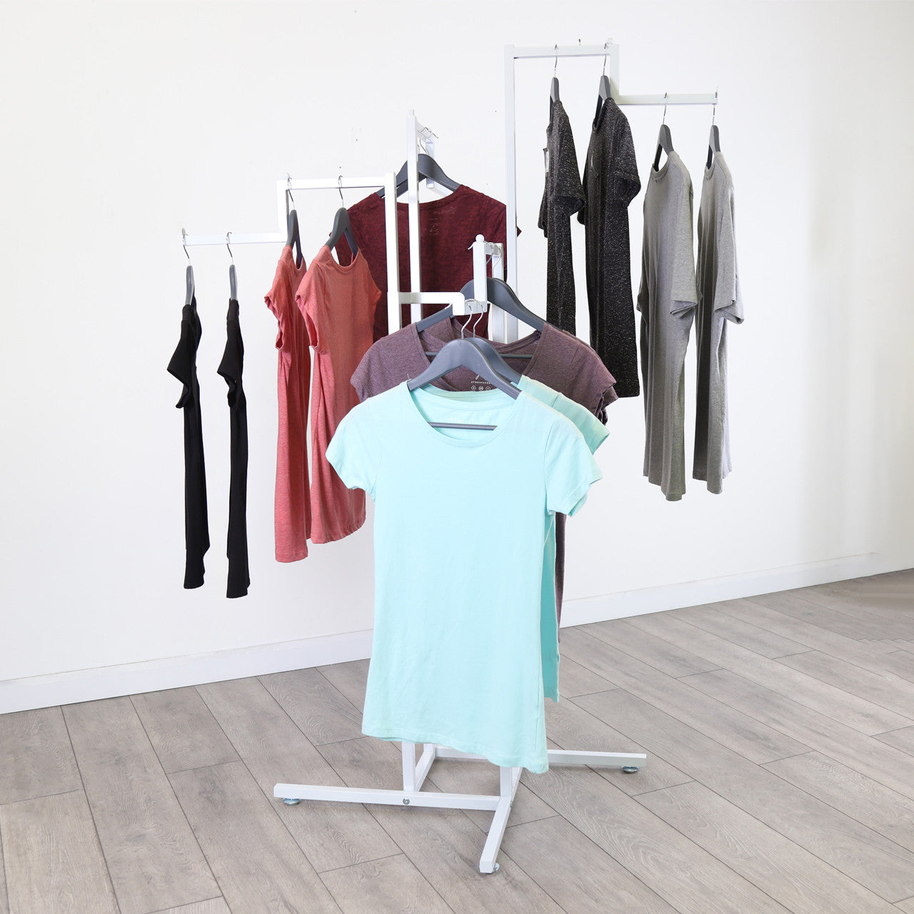 Gloss White Clothes Rail Display Stand - 4 Stepped Arms