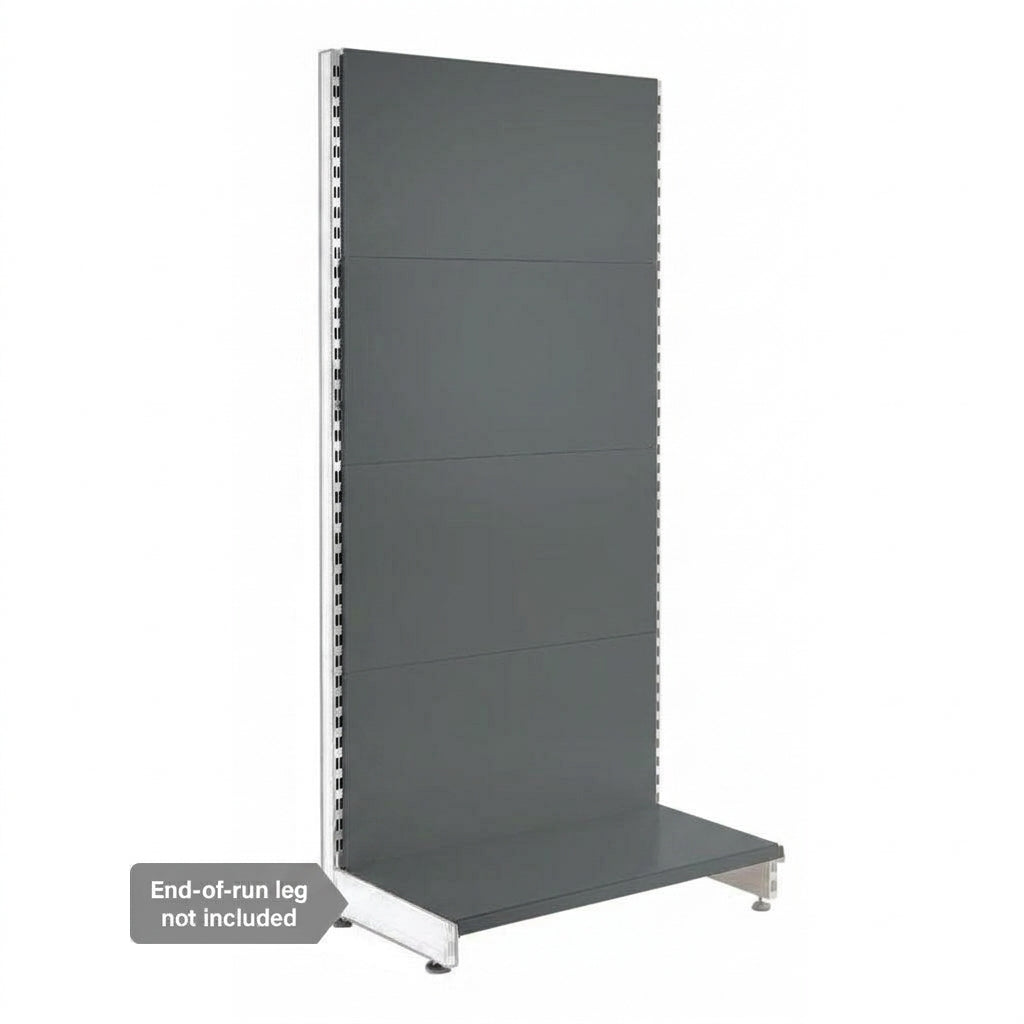 A dark gray retail display wall panel with a bottom shelf tray and silver metal support legs, shown on a white background with a note that the end-of-run leg is not included.
