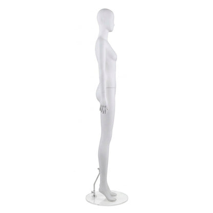 A white female mannequin figure shown in side profile, standing on a clear circular base with a small metal support arm against a plain white background.