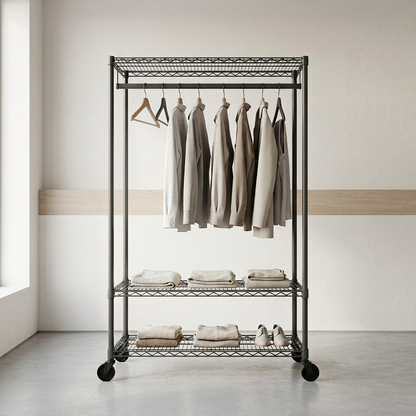 Mobile carbon grey wire clothes rack with three shelves displaying clothing in a boutique