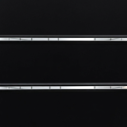 Close-up of black PVC inserts with continuous mirror strips on black slatwall