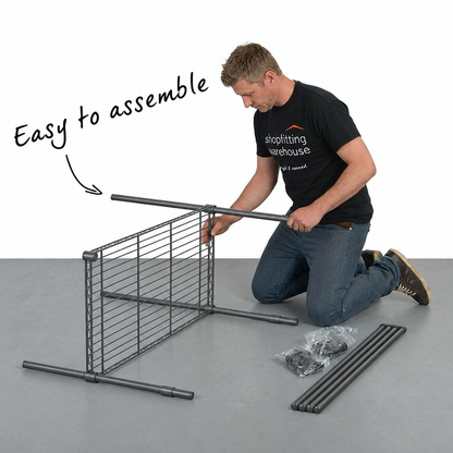 Man assembling carbon grey wire shelving with text reading 'Easy to assemble'