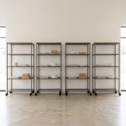 Four five-tier mobile carbon grey wire shelving units in a retail setting